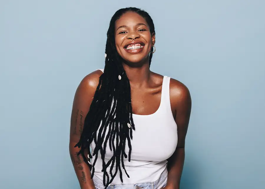 Images Salon Suites by Amani in Fairview Heights, IL - smiling woman with natural dreadlocks