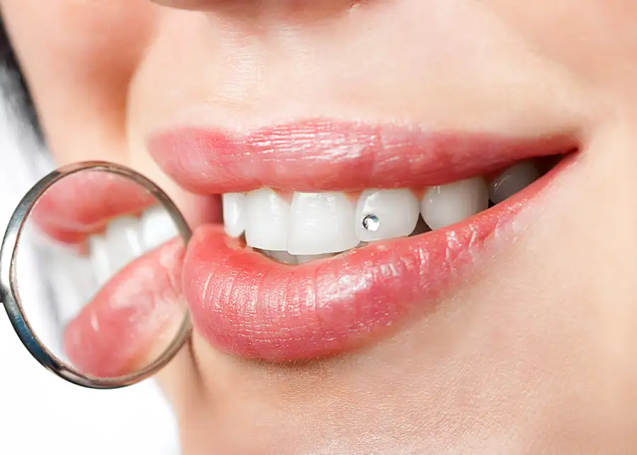 Images Salon Suites by Amani in Fairview Heights, IL - brand new tooth gem application